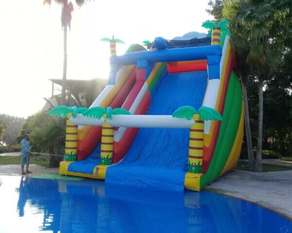 An inflatable water slide designed to attach to your pool, featuring a twisting slide and a splash pool at the bottom for endless fun and excitement.