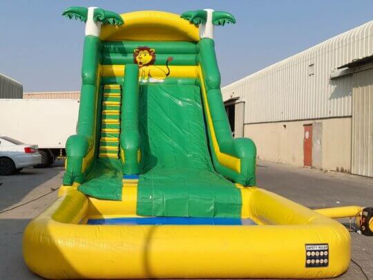 Rent our inflatable water slide for your next party or event, featuring a fun and colorful design and a twisting slide that ends in a splash pool.