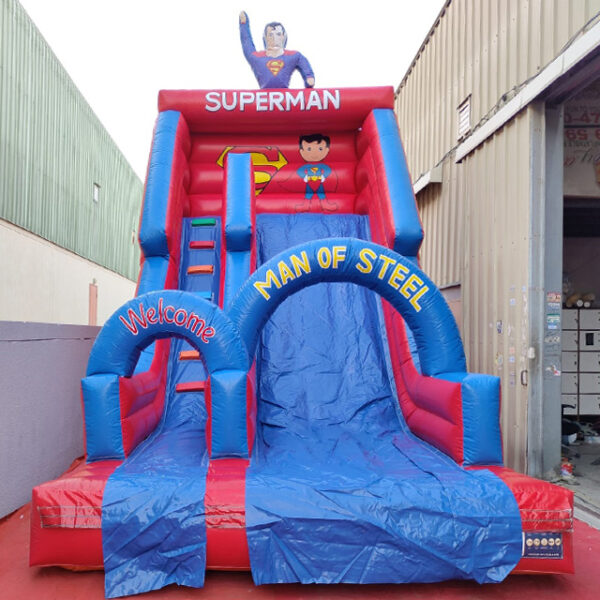Exciting Superman slide in action - a thrilling inflatable experience for superhero enthusiasts.